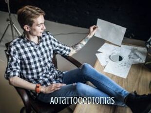 A0TattooedTomas